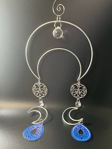 Symmetry in Motion Series: Blue Half-Moons